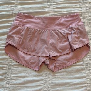 Pink Lululemon Speed Up shorts